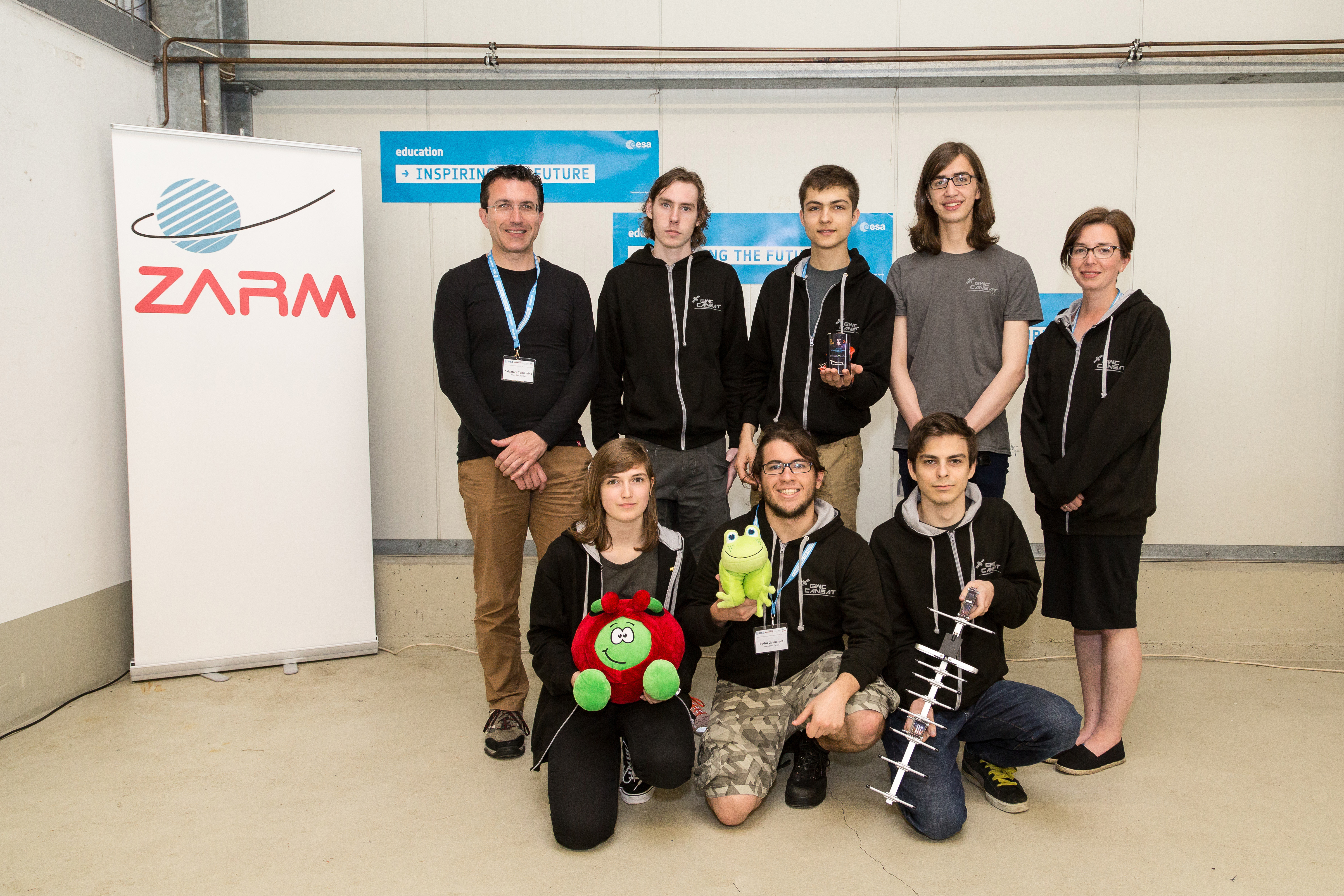 Team GWC, winners of the best report, with their CanSat and mascot