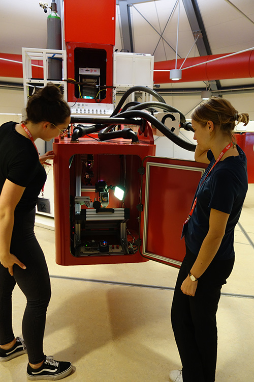 Students working on their experiment in one of the gondolas