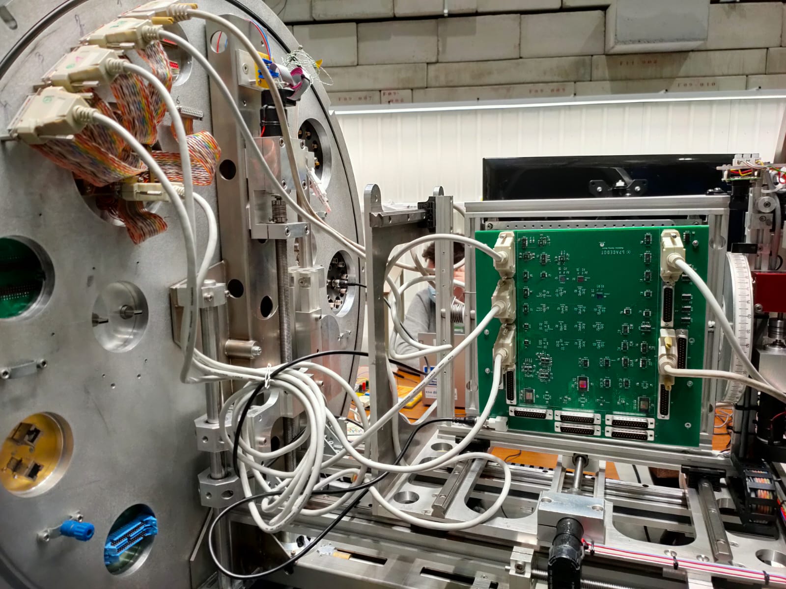 Student satellite components bombarded with heavy-ions during intense tests