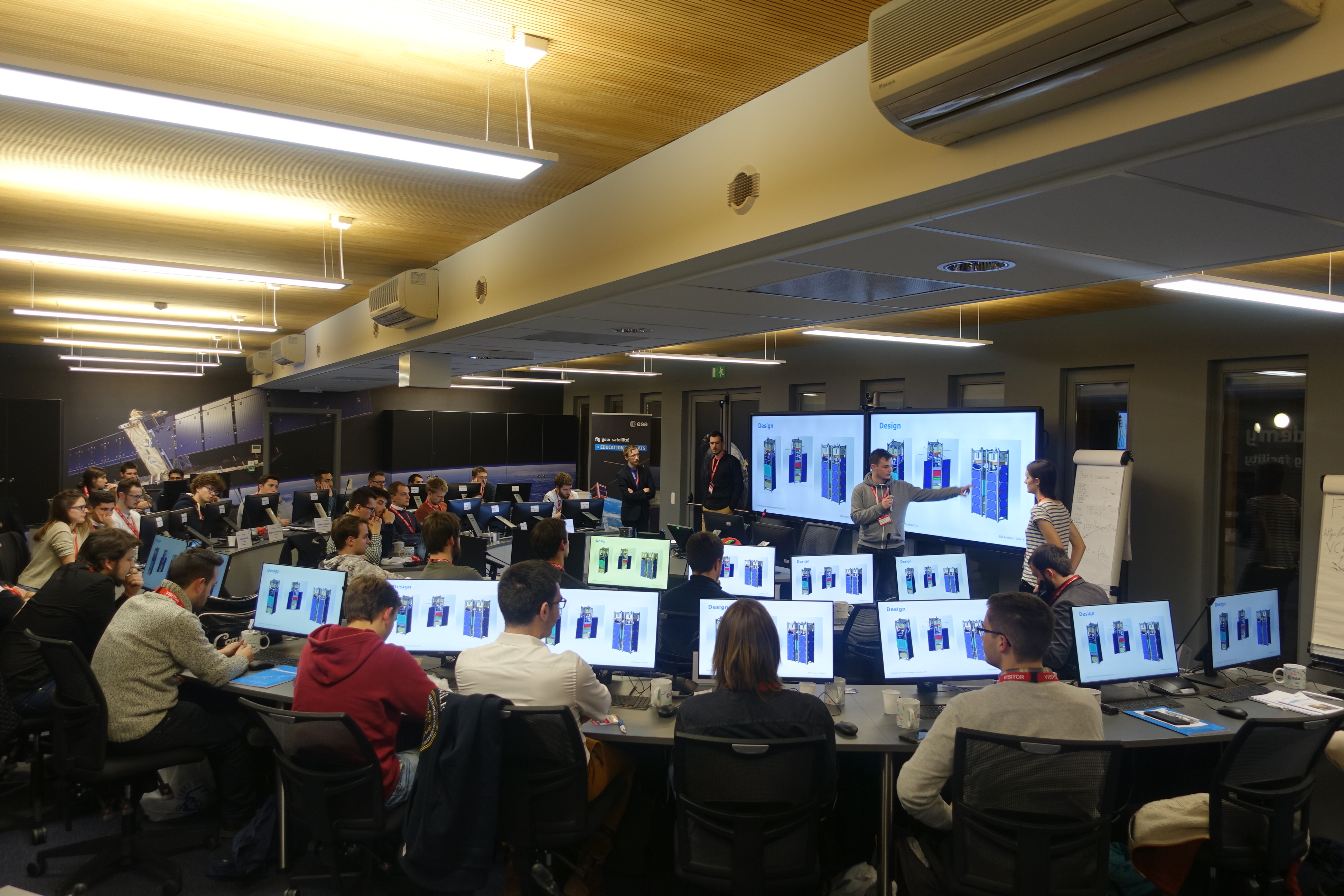 Students presenting their CubeSat design concept after the concurrent design study.