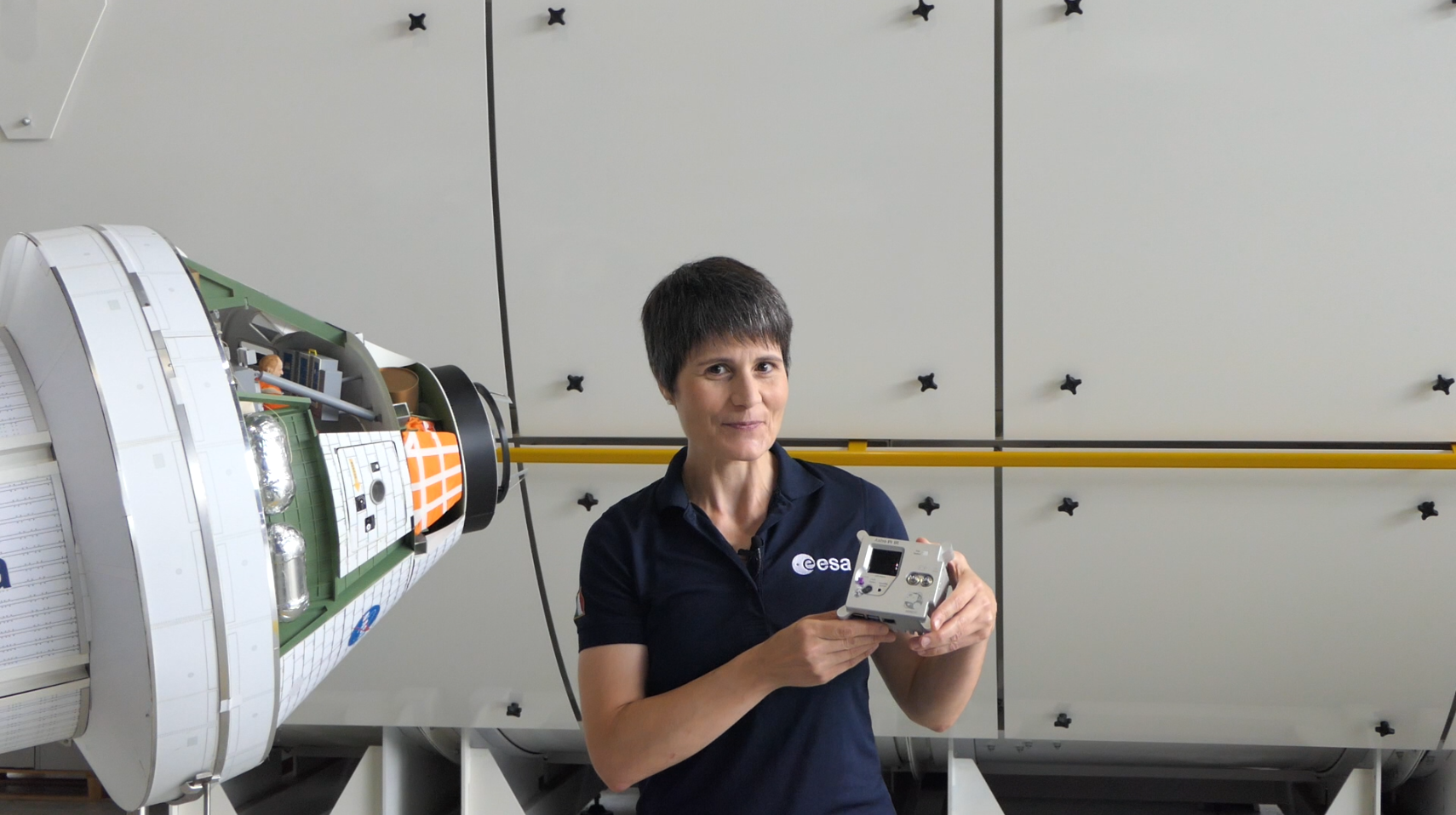 The European Astro Pi Challenge 2022-23 Ambassador, Samantha Christoforetti, holding an Astro Pi