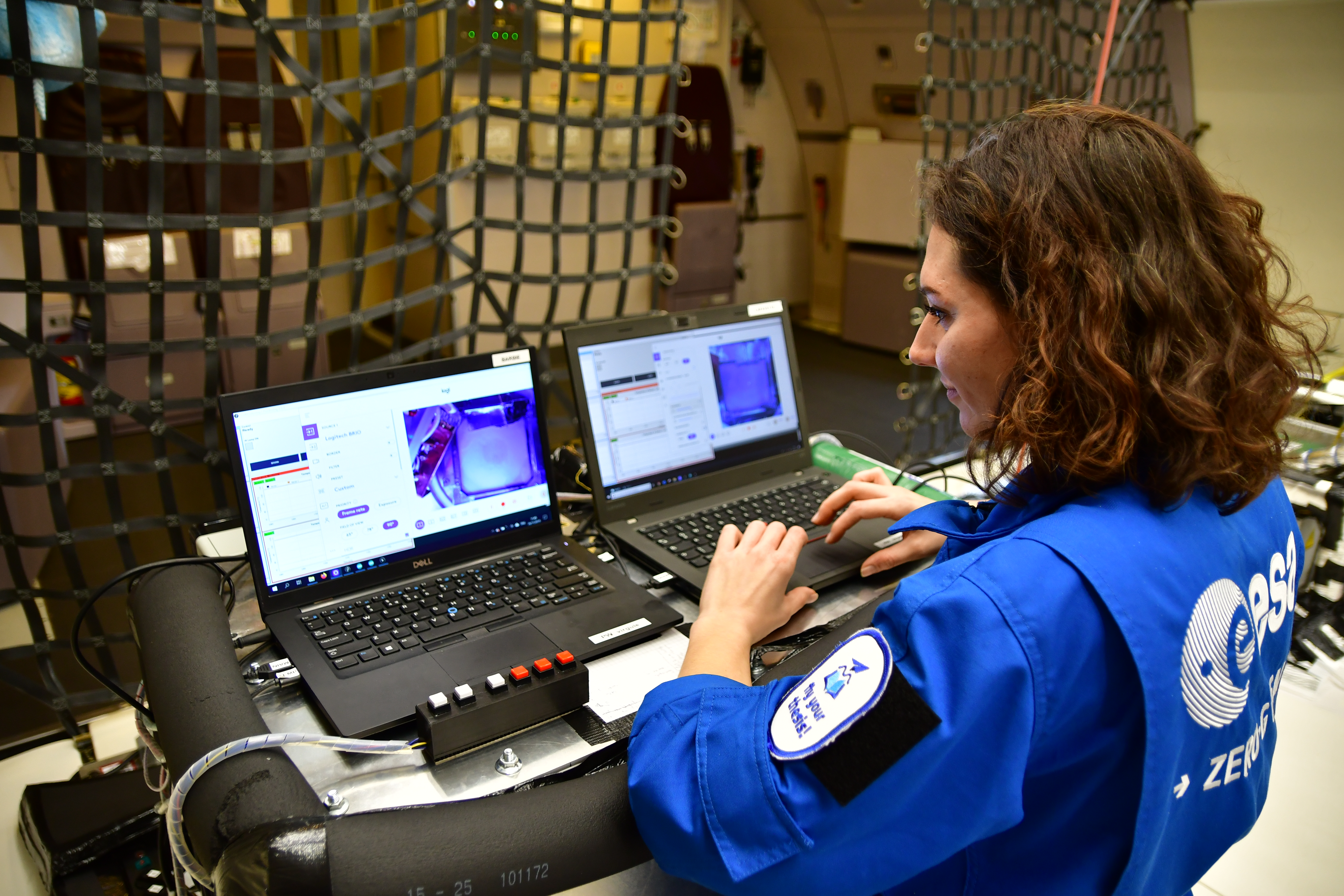 A student participating in a parabolic flight campaign