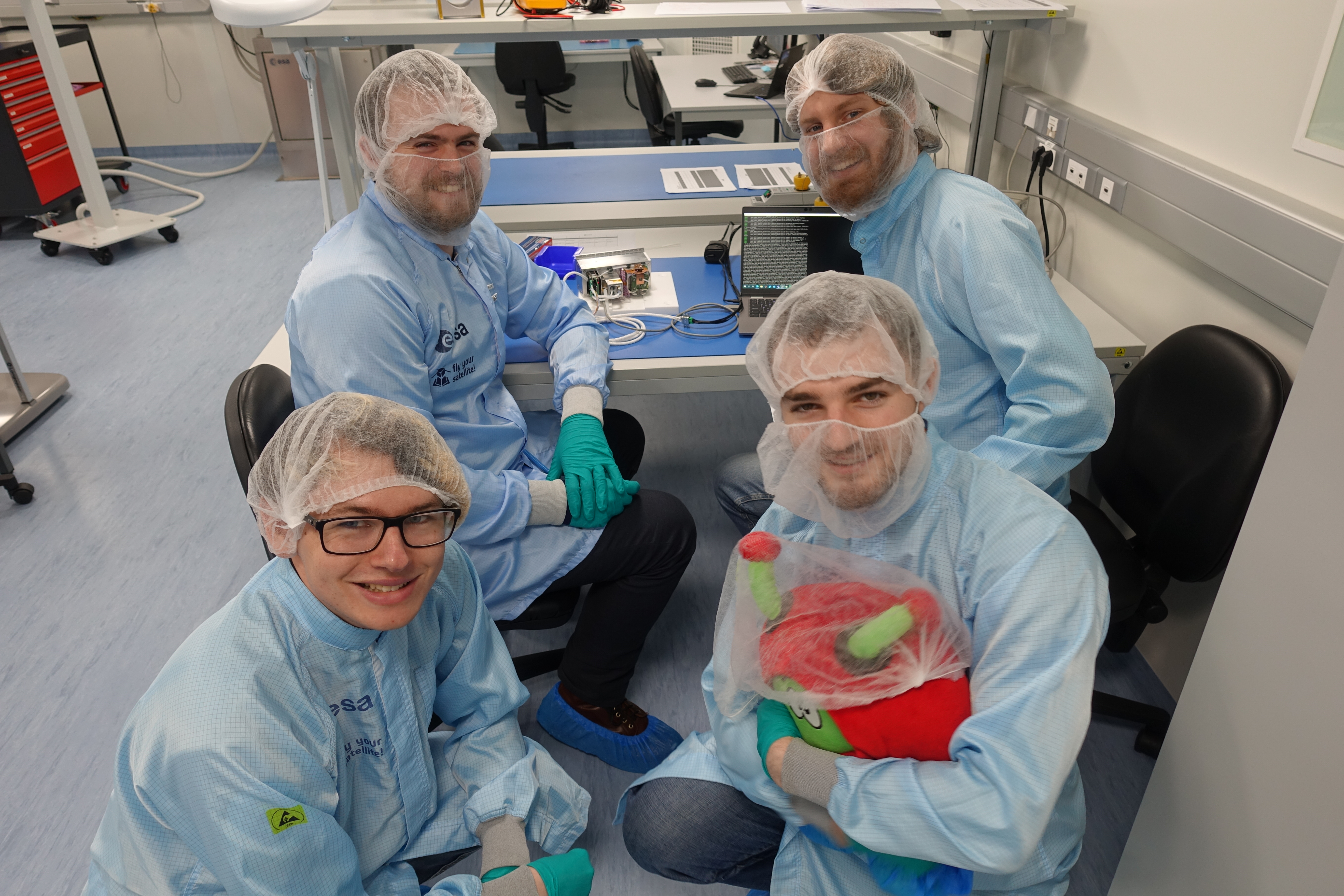 UoBSat thermal vacuum testing team with their test item