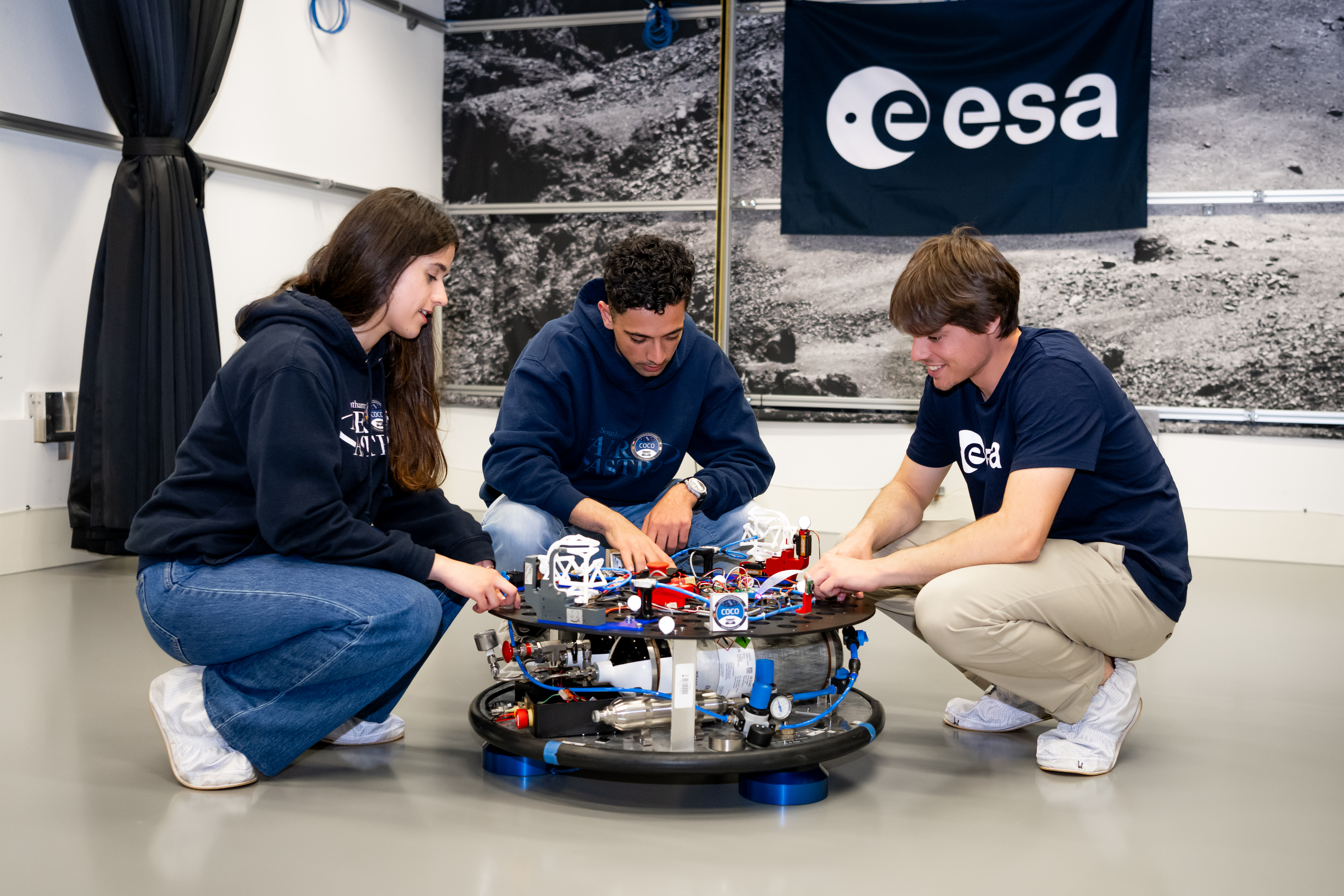 Three members of Team Coco on Orbital Robotics Lab