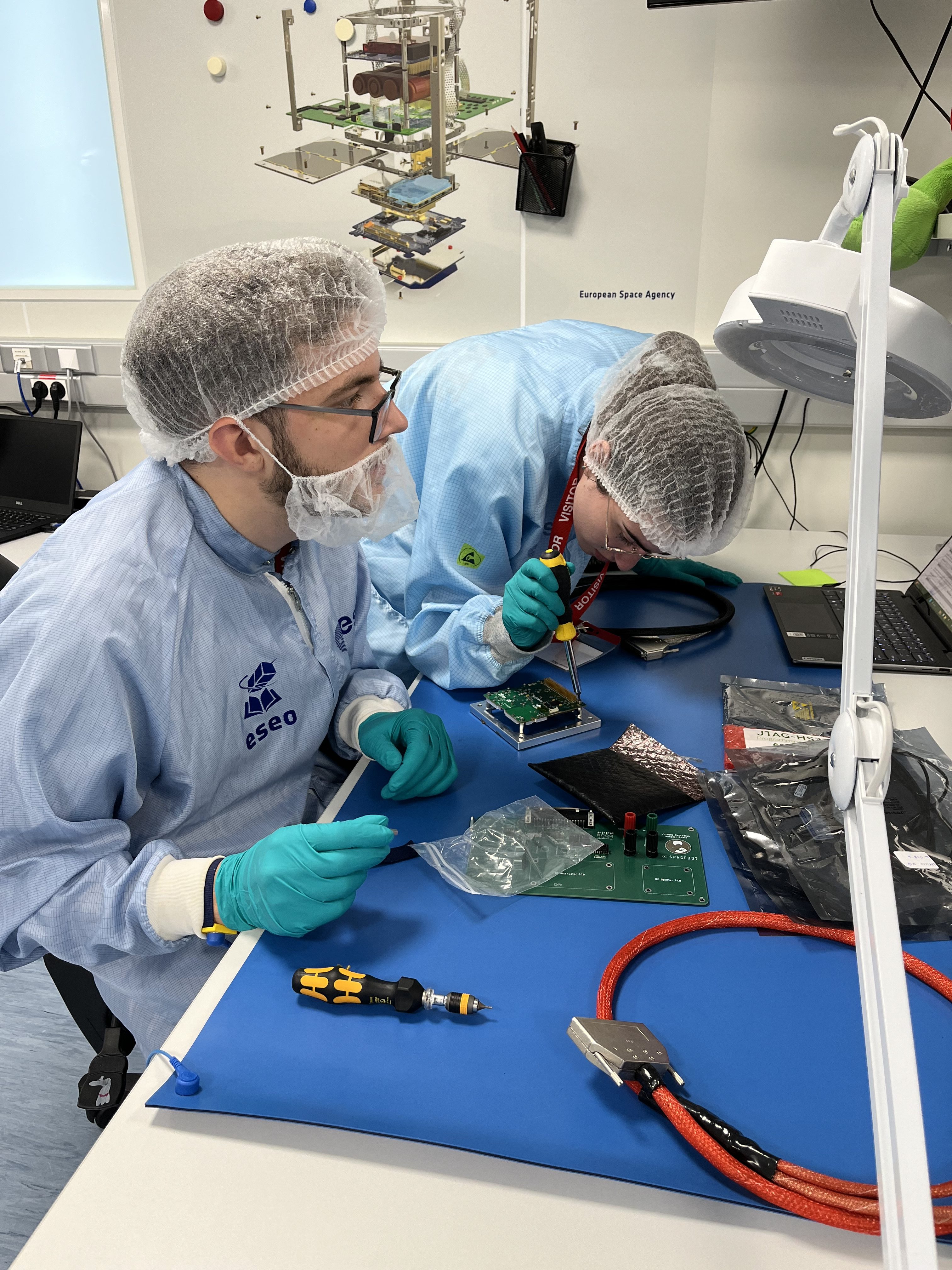 Students preparing their subsystem for the vibration test.