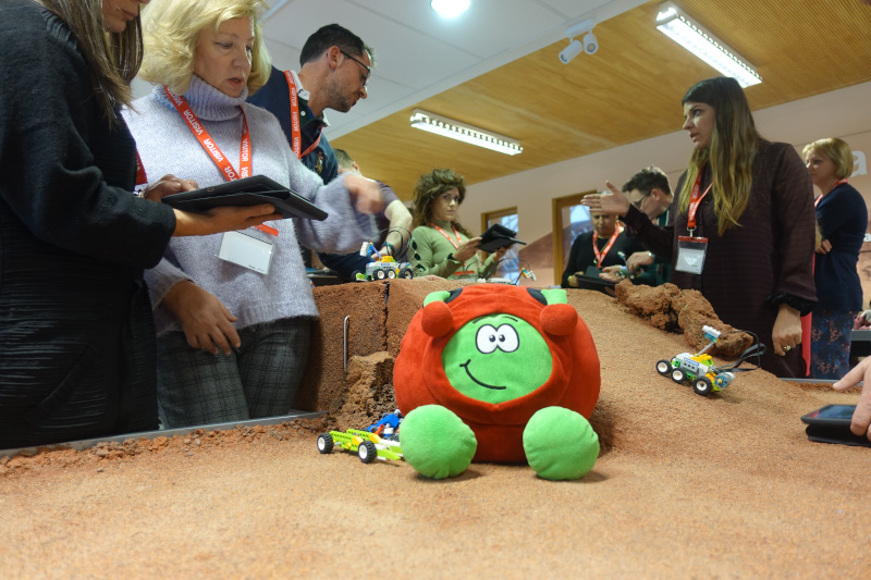 Teachers exploring the surface of planet Mars.