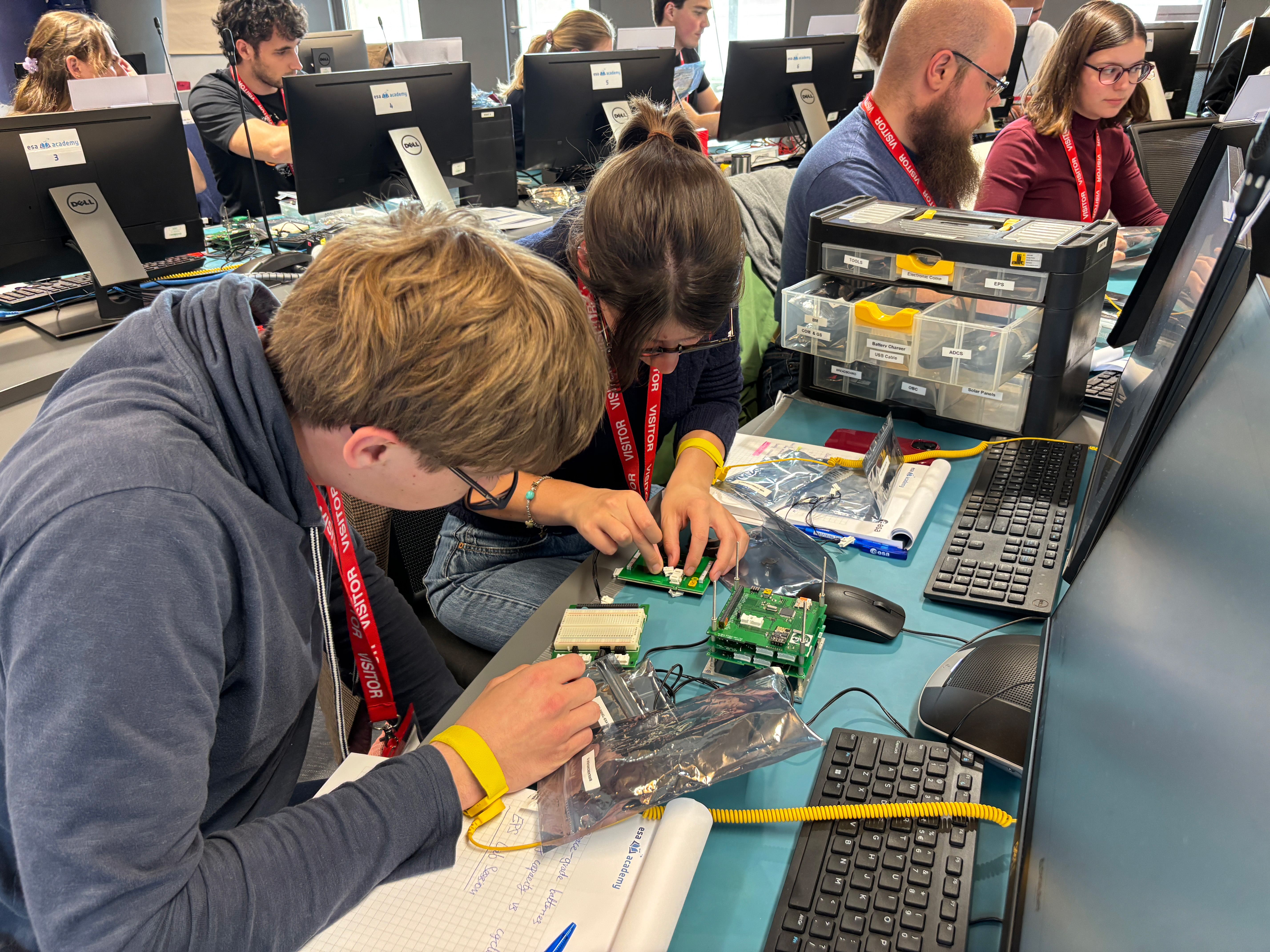 University students performing tests on a partially-configured ESAT
